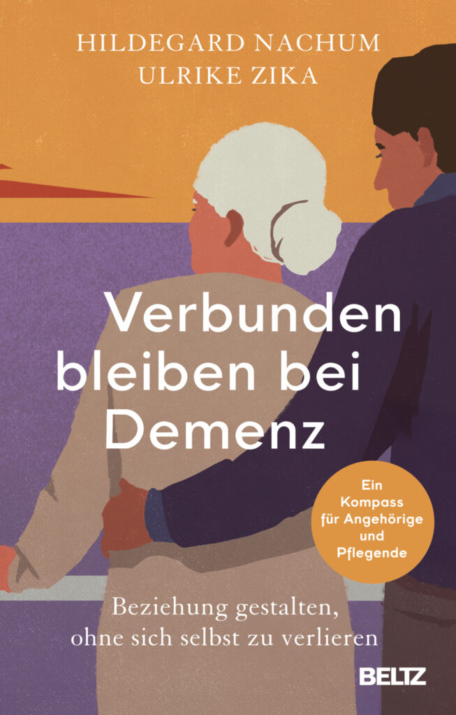 Book cover for'Verbunden bleiben bei Demenz' featuring an elderly person with white hair being supported by a caregiver against an orange and purple background; includes author names and a round orange sticker mentioning 'Ein Kompass für Angehörige und Pflegende'.
